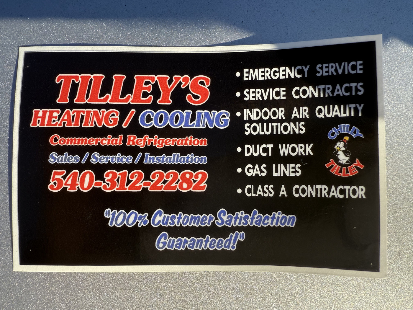 Tilley's Heating & Cooling business card